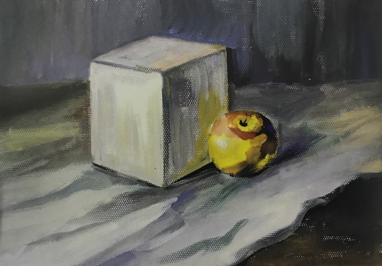 评析:作品采用苹果与石膏正方体的组合,构图合理,色调统一,画面完整。不足之处有两点:一是表达手法有些单一,二是细节上可再加强联系。
